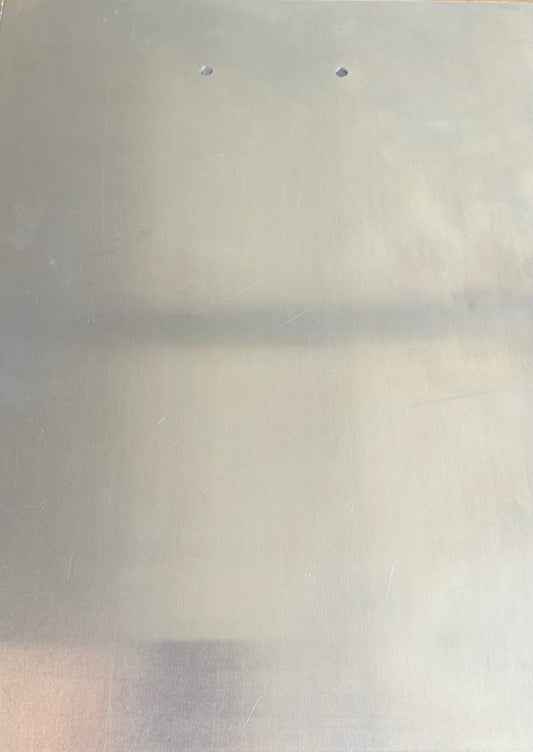 Aluminum back pad pre-drilled for manifold